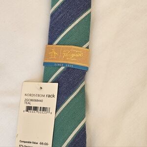 Penguin Tie. Blue green and white diagonal stripe.